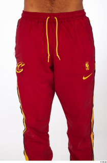 Nabil dressed red athletic track pants sports thigh 0001.jpg